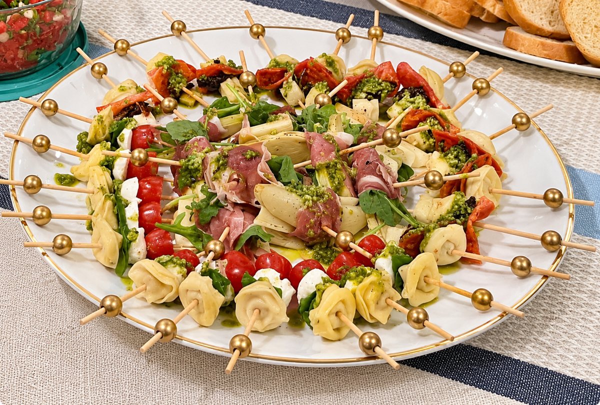 Antipasto skewers with tortellini, mozzarella, tomato and prosciutto