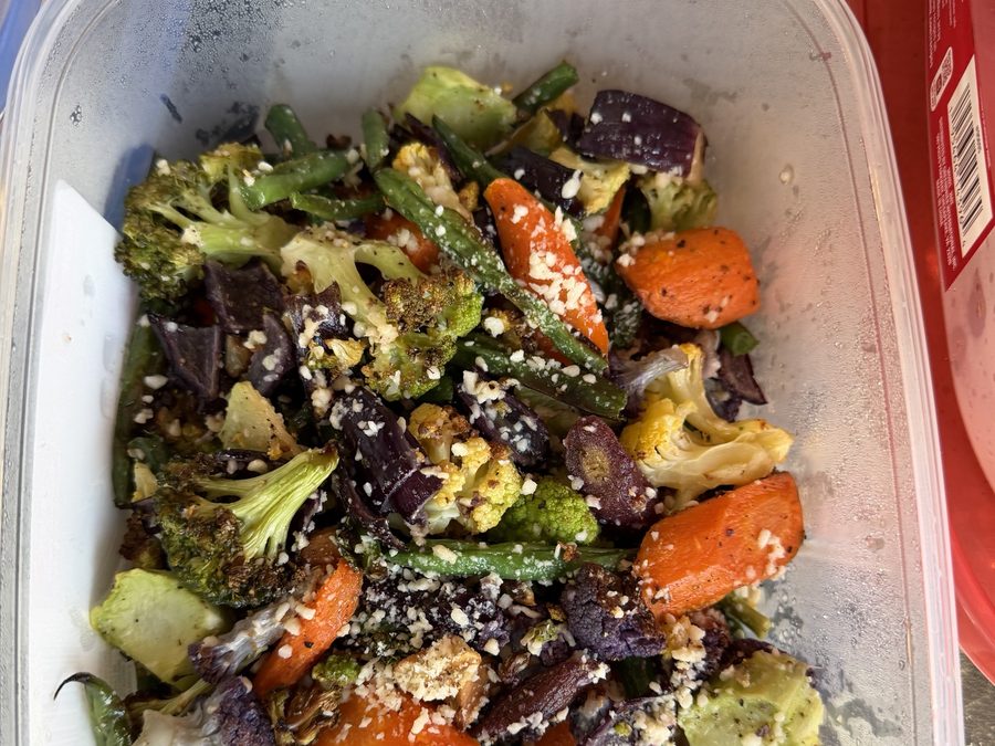 Roasted rainbow vegetables with parmesan, packed in a container