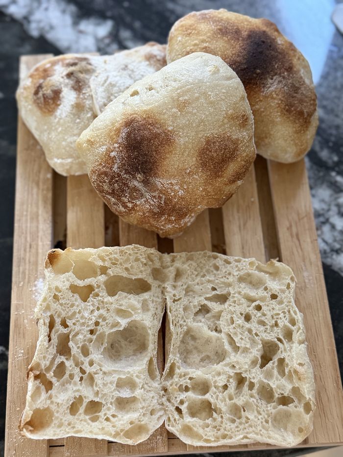 Ciabatta cut open to show the airy crumb